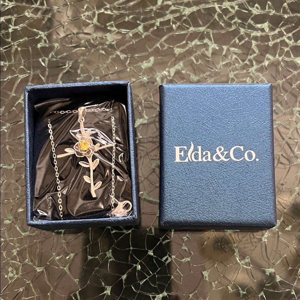 Silver Necklace with Gold Flower Pendant